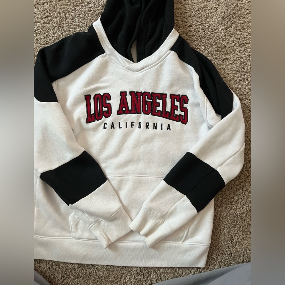 A Hollister hoodie size small fits perfectly isn’t too big is not too small.